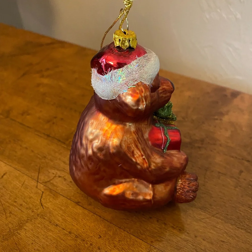 Festive Christmas Bear Holding Present Glass Ornament